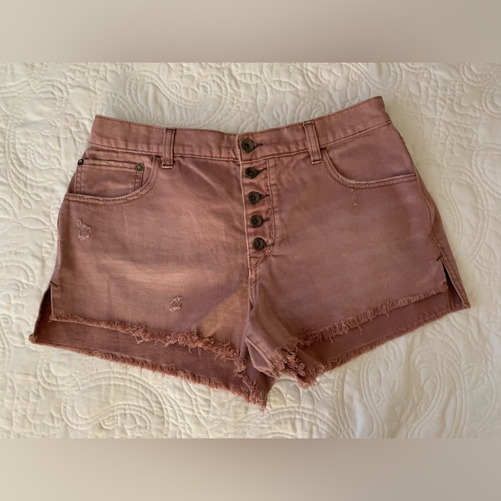 Free people pink denim shorts with button fly 
sz 31